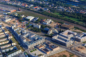 Green Mile with Qube Hotel 2, LUXOR Cinema 1 and Elementary School 2 at Gadamerplatz in the district Bahnstadt in Heidelberg in the state Baden-Wuerttemberg, Germany