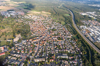 Aerial view of Town View of the streets and houses of the residential areas in Hochstadt in the state Hesse, Germany