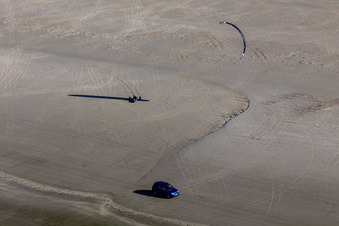 Aerial photograpy of Buggies and kite surfers on the sandy beach in Fanø in the state South Denmark, Denmark