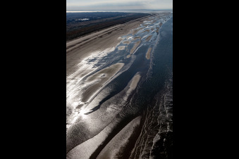 Aerial view of Cars riding on the Beach along the West coast of Northsea island in Fanoe in, Denmark