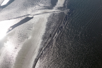 Aerial view of West coast at low tide in Fanø in the state South Denmark, Denmark