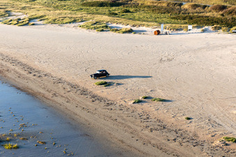 Beach landscape along the with Oldtimer vintage car Citroen auf Nordseeinsel in Fanoe in Syddanmark, Denmark