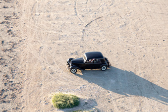 Aerial photograpy of Citroen vintage car on the beach in Fanø in the state South Denmark, Denmark