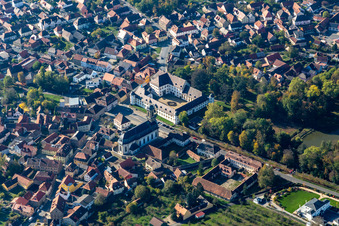 Aerial view of Graf Schönborn - Castle Wiesentheid, Mauritius Church and Old Chancellery Buildings in Wiesentheid in the state Bavaria, Germany