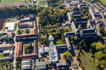 Aerial photograpy of Complex of buildings of the monastery Abtei Muensterschwarzach in Schwarzach am Main in the state Bavaria, Germany