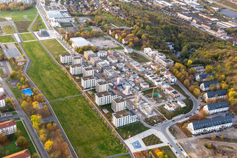 Residential construction site with multi-family housing development- on the along the Norbert-Glanzberg-strasse in Wuerzburg in the state Bavaria, Germany Two larger buildings were built by the construction community "Wuerzburg GbR" and planned for the companies "bogevischs buero architekten & stadtplaner GmbH" and "bauart Konstruktions GmbH + Co. KG", and more of the "INDUSTRIA WOHNEN GmbH" are to be built here