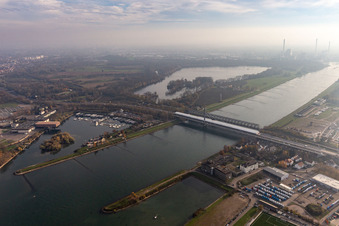 Rail and Street bridges with a huge tent for renovation purposes across the Rhine river between Karlsruhe and Woerth am Rhein in the state Rhineland-Palatinate, Germany