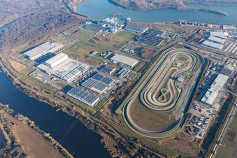 Test track for lorrys of Daimler with industrial estate of Europack GmbH, MEG GmbH, Netto, Papierfabrik Palm GmbH & Co. KG and NUSS-Unternehmensgruppe in Woerth am Rhein in the state Rhineland-Palatinate, Germany