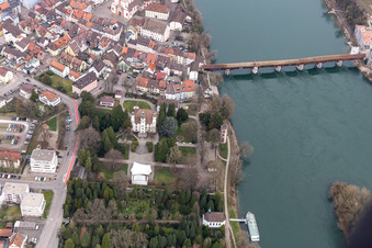 Aerial view of City center with old town and Castle Schoenau and the historic bridge to Switzerland crossing the river Rhine in Bad Saeckingen in the state Baden-Wurttemberg, Germany