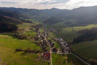 Location view of the streets and houses of residential areas in the valley landscape surrounded by mountains of the black forest in Prinzbach in the state Baden-Wuerttemberg, Germany