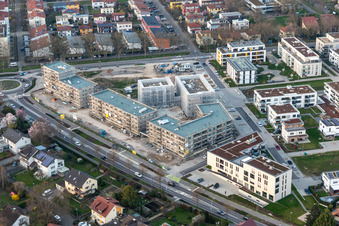 Oblique view of Construction site of a new residential area of the terraced housing estate Im Seidenfaden in Offenburg in the state Baden-Wuerttemberg, Germany