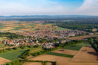 Village - view on the edge of agricultural fields and farmland in Hoerdt in the state Rhineland-Palatinate