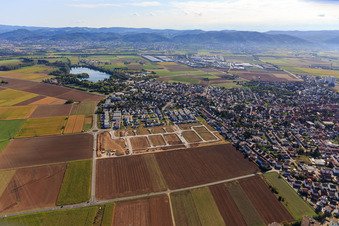 New development area "Mitten im Feld" and Odenwaldstr in Heddesheim in the state Baden-Wuerttemberg, Germany viewn from the air
