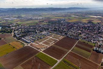 Location view of the streets and houses of residential areas in the valley of the Rhine surrounded by mountains of the Odenwald in Heddesheim in the state Baden-Wuerttemberg, Germanyjcoffee1