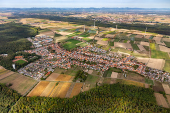 Aerial view of Village view on the edge of agricultural fields and land in Hatzenbuehl in the state Rhineland-Palatinate, Germany