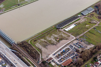 Aerial view of Cleared Daimler truck parking area in the flood area in front of the Rhine dam in the district Maximiliansau in Wörth am Rhein in the state Rhineland-Palatinate, Germany