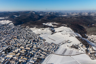 Aerial view of Wintry snowy townscape with streets and houses of the residential areas in Bad Bergzabern in the state Rhineland-Palatinate
