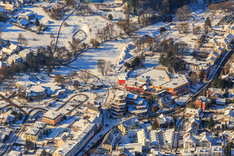 Aerial view of Winter aerial view in the snow of the Südpfalz Therme in the spa park in Bad Bergzabern in the state Rhineland-Palatinate, Germany