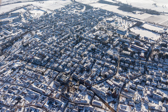 Winter aerial photograph in the snow from Bad Bergzabern SE in Bad Bergzabern in the state Rhineland-Palatinate, Germany