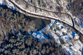 Winter aerial view in the snow of Hotelpension Seeblick in the Kurtal in Bad Bergzabern in the state Rhineland-Palatinate, Germany