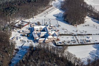 Aerial view of Winter aerial view in the snow of the Liebfrauenberg Monastery in Bad Bergzabern in the state Rhineland-Palatinate, Germany