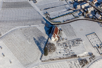 Wintry snowy churches building the chapel Dionysius and grave-yard in the wine-yards near the district Gleishorbach in Gleiszellen-Gleishorbach in the state Rhineland-Palatinate