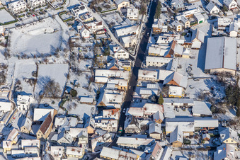 Winter aerial view in the snow of the Wine Route Klingenmünster in Klingenmünster in the state Rhineland-Palatinate, Germany