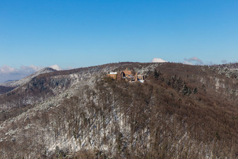 Winter aerial view in the snow of Madenburg in Eschbach in the state Rhineland-Palatinate, Germany