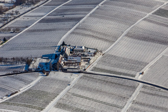Aerial view of Wintry snowy complex of the hotel building " Leinsweiler Hof " in Leinsweiler in the state Rhineland-Palatinate, Germany