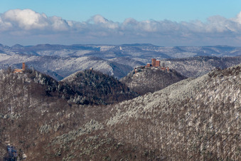 Winter aerial view in the snow of the three castles Trifels, Anebos Scharfenberg from the Birnbachtal in Waldrohrbach in the state Rhineland-Palatinate, Germany