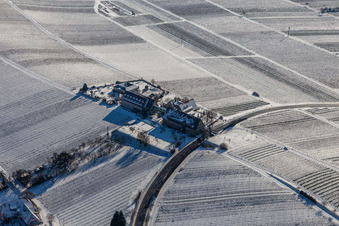 Aerial photograpy of Wintry snowy complex of the hotel building " Leinsweiler Hof " in Leinsweiler in the state Rhineland-Palatinate, Germany