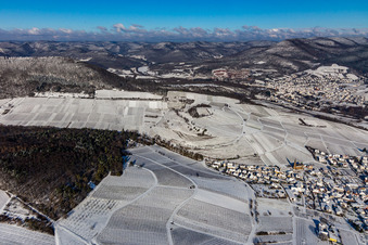 Winter aerial view in the snow of the Kestenbusch vineyard in Birkweiler in the state Rhineland-Palatinate, Germany