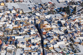 Winter aerial view in the snow of the Protestant church on the Weinstraße in Frankweiler in the state Rhineland-Palatinate, Germany