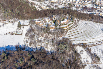 Aerial view of Winter aerial view in the snow of Kropsburg Castle in the district SaintMartin in Sankt Martin in the state Rhineland-Palatinate, Germany