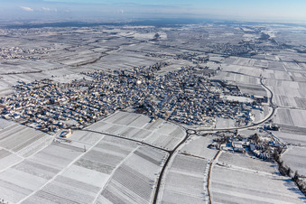 Winter aerial view in the snow in the district Alsterweiler in Maikammer in the state Rhineland-Palatinate, Germany