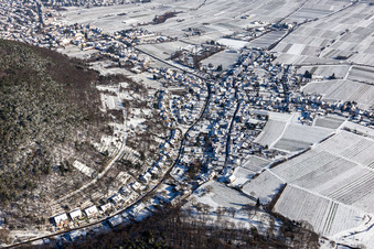 Winter aerial view in the snow in the district Hambach an der Weinstraße in Neustadt an der Weinstraße in the state Rhineland-Palatinate, Germany