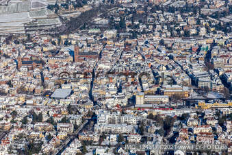 Winter aerial view of the main street in the snow in Neustadt an der Weinstraße in the state Rhineland-Palatinate, Germany