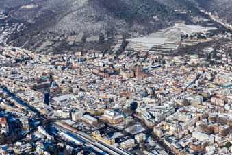 Aerial view of Winter aerial view in the snow with Catholic Parish Church of St. Mary and Protestant Collegiate Church in Neustadt an der Weinstraße in the state Rhineland-Palatinate, Germany