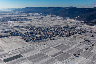 Winter aerial view in the snow in the district Diedesfeld in Neustadt an der Weinstraße in the state Rhineland-Palatinate, Germany
