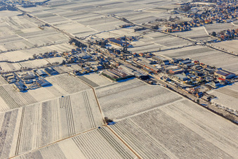 Aerial view of Winter aerial view of the Bordmühle industrial area in the snow in Kirrweiler in the state Rhineland-Palatinate, Germany