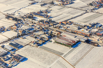 Aerial view of Winter aerial view of the Bordmühle industrial area in the snow in Kirrweiler in the state Rhineland-Palatinate, Germany