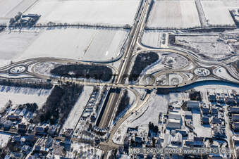 Winter aerial view in the snow, motorway exit Landau Zentrum in the district Queichheim in Landau in der Pfalz in the state Rhineland-Palatinate, Germany