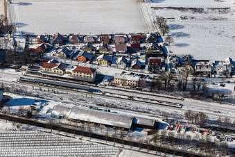 Winter aerial view of the snowy train station in Winden in the state Rhineland-Palatinate, Germany