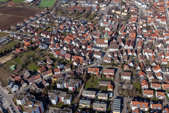 Town center with town hall and St. Peter's Church from the south in Renningen in the state Baden-Wuerttemberg, Germany