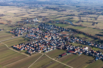 Aerial view of Village - view on the edge of agricultural fields and farmland in Erpolzheim in the state Rhineland-Palatinate