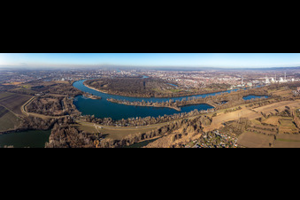 Panoramic perspective of curved loop of the riparian zones on the course of the river Rhine around the island "Reiss" near Neckarau in Mannheim in the state Baden-Wuerttemberg, Germany