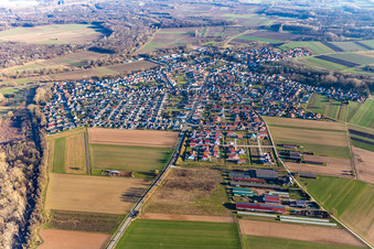 Village view on the edge of agricultural fields and land in Hoerdt in the state Rhineland-Palatinate, Germany