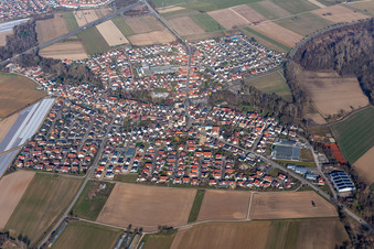 Aerial view of Village - view on the edge of agricultural fields and farmland in Kuhardt in the state Rhineland-Palatinate, Germany