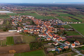 Aerial view of Village - view on the edge of agricultural fields and farmland in Schweighofen in the state Rhineland-Palatinate, Germany