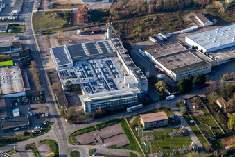 Aerial view of Location view of the streets and houses of residential areas in the rhine valley landscape surrounded by mountains in Edenkoben in the state Rhineland-Palatinate, Germany